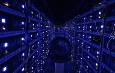 A large-scale mining farm with rows of mining rigs, showcasing the scale and infrastructure involved in cryptocurrency mining